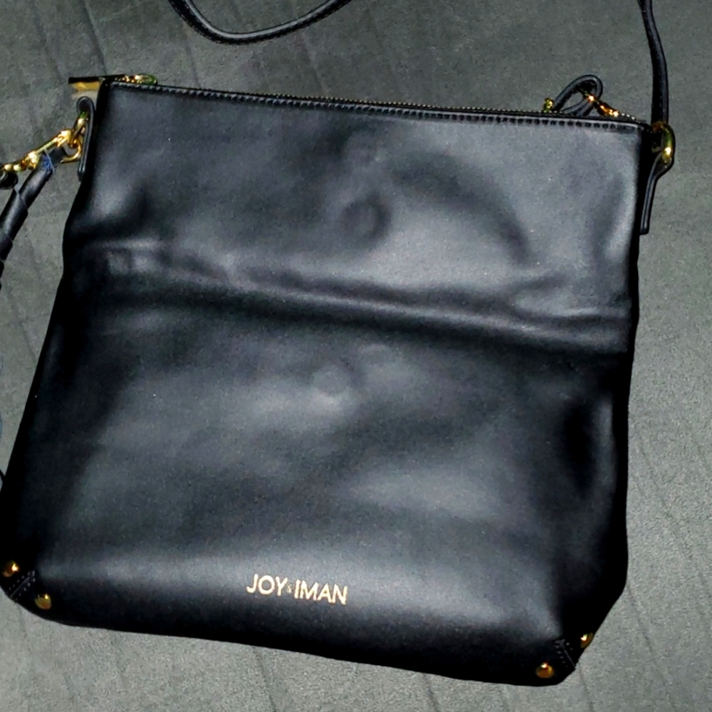 Joy & Iman adjustable black leather purse with cotton lining